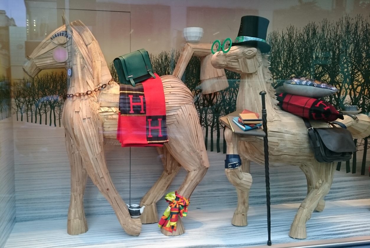 wood sculptures of horses